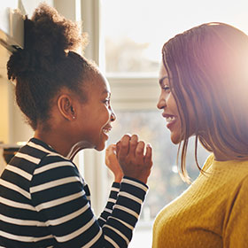 excited mother and daughter