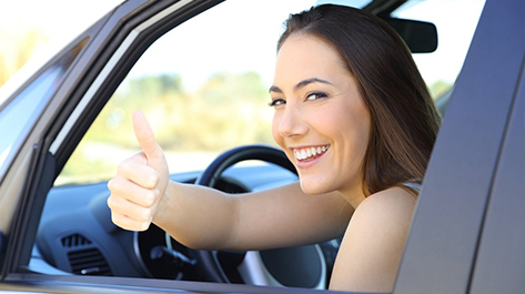 Woman excited about getting her new car loan with Velocity Community Credit Union