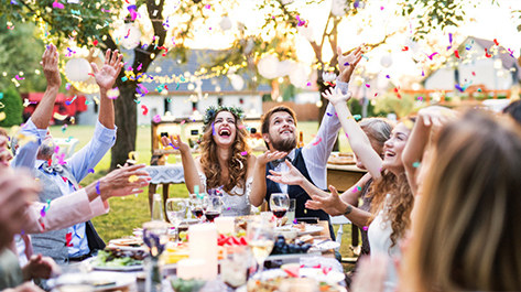 Couple at their backyard wedding that saved for a house and wedding at the same time