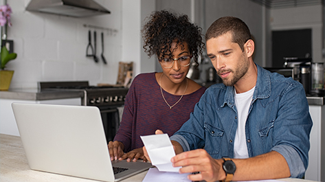 A couple in a financial crunch planning to prioritize their bills