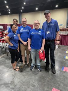 Velocity Community Credit Union Staff volunteering at Back to School Bash