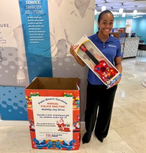 Velocity Community Credit Union Staff supporting Palm Beach Gardens Annual Holiday Joy Drive