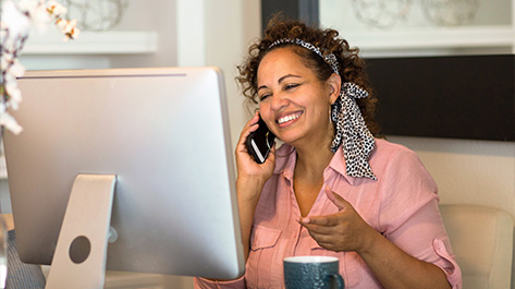 Older woman on the phone discussing the benefits of a part-time job